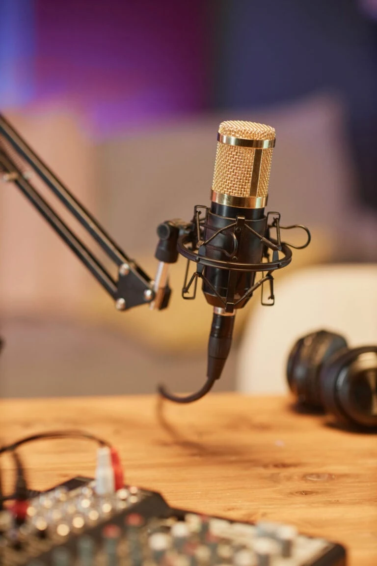 A podcast mic at a table set up